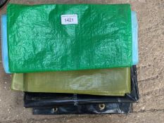 Four various size tarpaulins