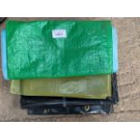 Four various size tarpaulins