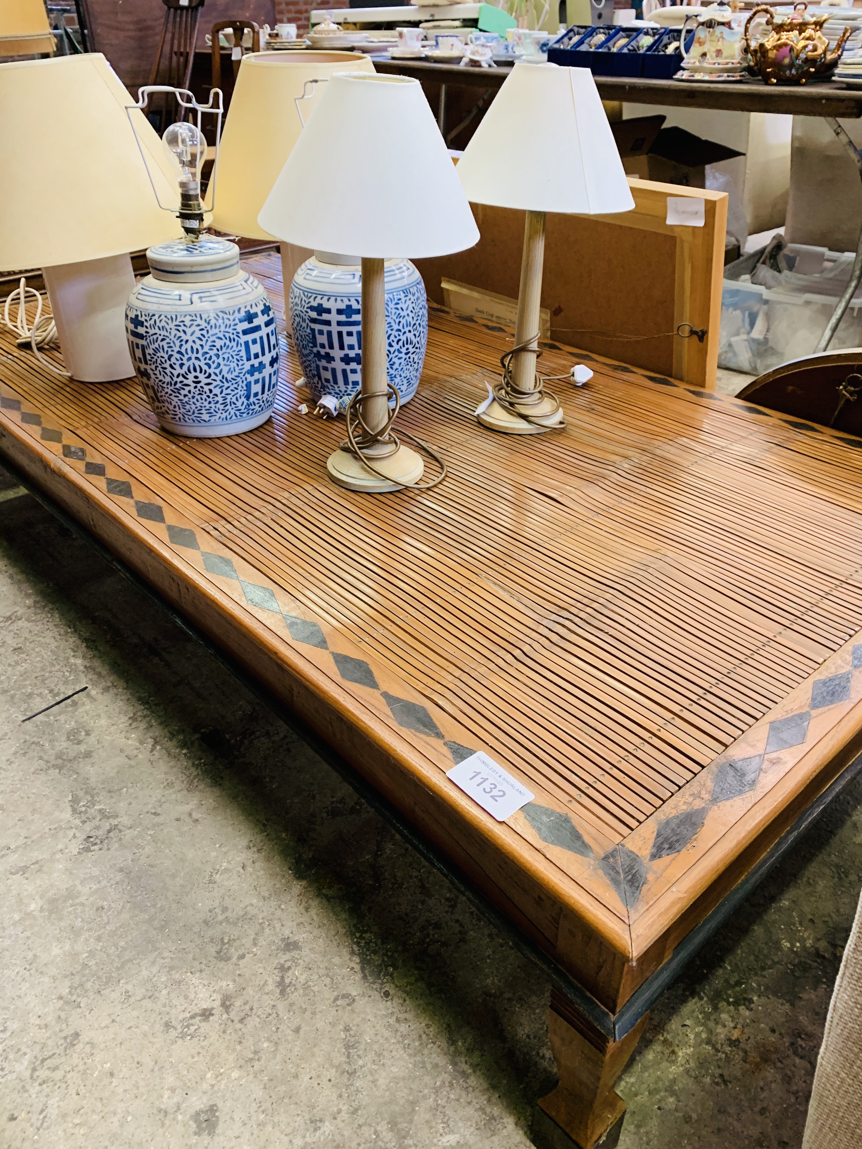 Large coffee table with split bamboo top.