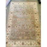 Chinese olive ground carpet 175 x 114cms.