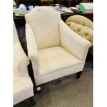 Upholstered armchair requiring loose cover.