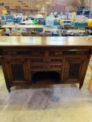 Carved mahogany sideboard.