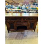 Carved mahogany sideboard.