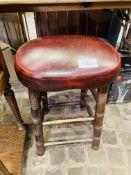 Leather top stool as found.
