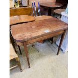 Mahogany gate leg side table with fold over top on tapered legs.