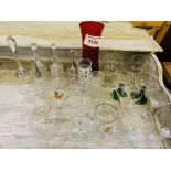 Quantity of drinking glasses and glass bells.