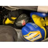 Holdall containing a quantity of boxing gear, gloves, shoes, shorts and top.