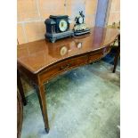 Mahogany serpentine fronted string inlaid sideboard.