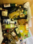 Box containing a large quantity of alcohol miniatures.