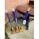 3 Hockey sticks mounted on wooden bases.