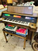 Kimble electric organ, stool, instructions & sheet music.