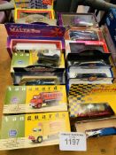 17 die cast model vehicles, new, boxed.