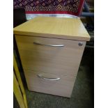 Two drawer filing cabinet and a pine stool.