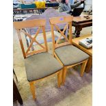 Two modern dining chairs.