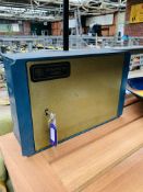 Steel Dominator safe with key.