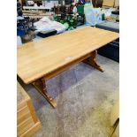 Pine table on end supports with centre stretcher, plus 4 matching chairs.