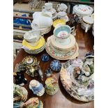 Assorted chinaware and figurines.