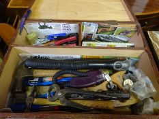 Wooden box containing hand tools.