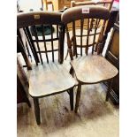 Two elm seat comb back kitchen chairs.