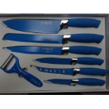 Coloured knife set. This item carries VAT.