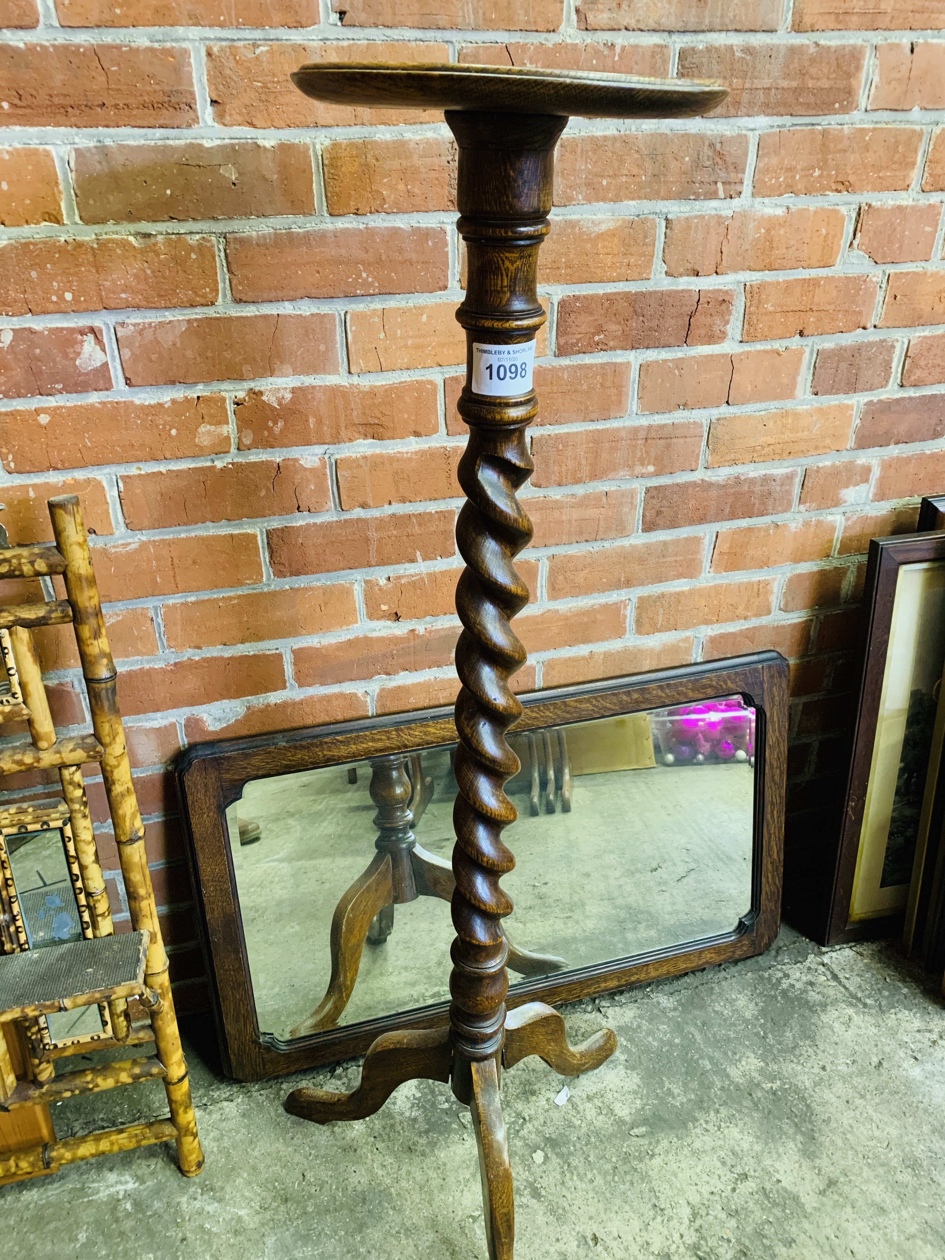 Barley twist oak and mahogany pot stand.