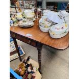 Mahogany drop leaf table on turned legs with side frieze drawer.