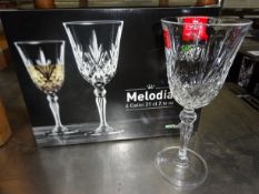 6 Melodia Crystal goblets. This item carries VAT.
