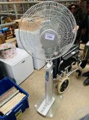 Floor standing fan.