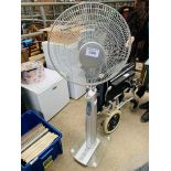 Floor standing fan.