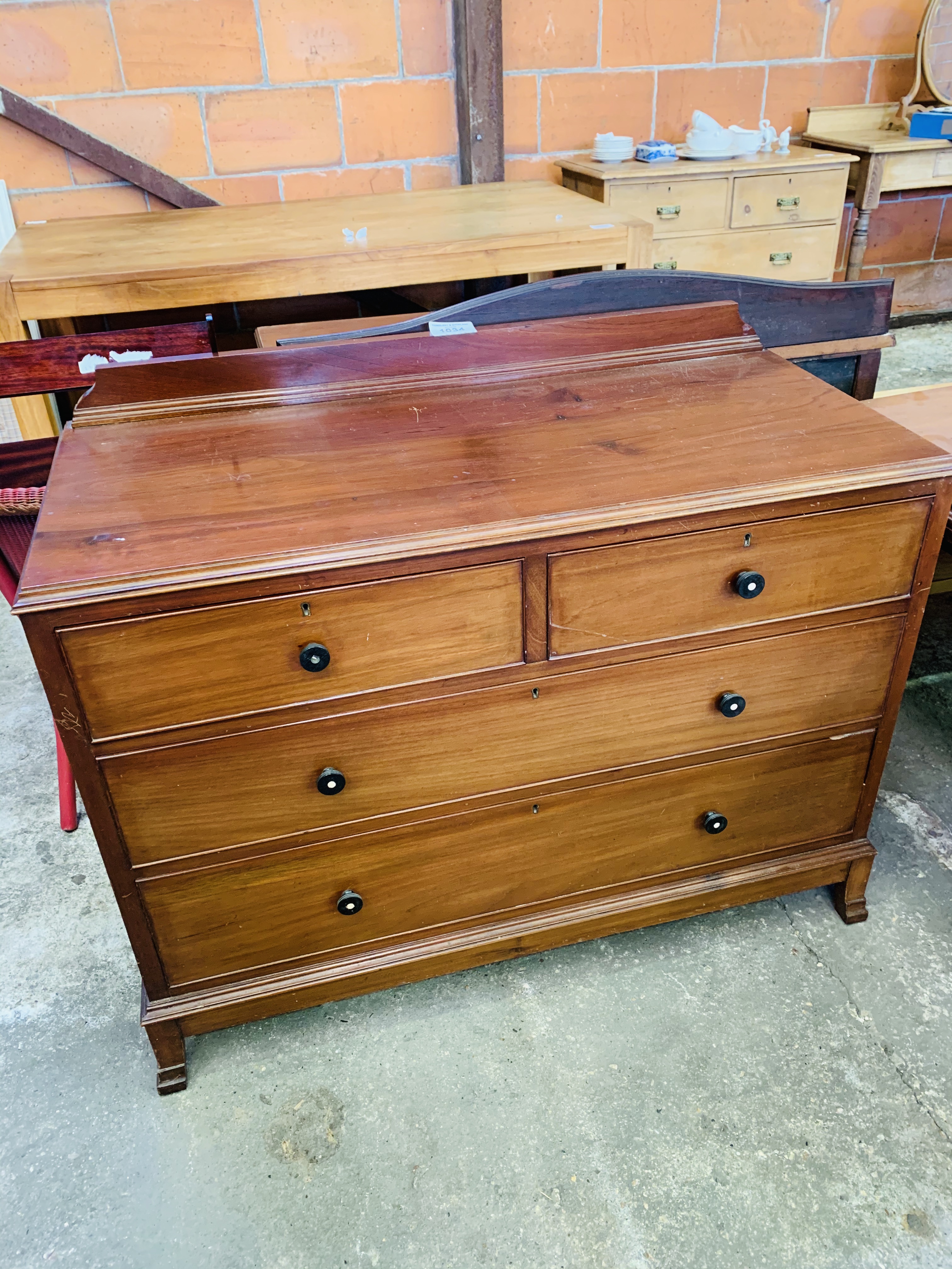 Mahogany chest over two over two graduated drawers.