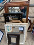 Seven various framed mirrors.