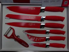 Coloured knife set. This item carries VAT.