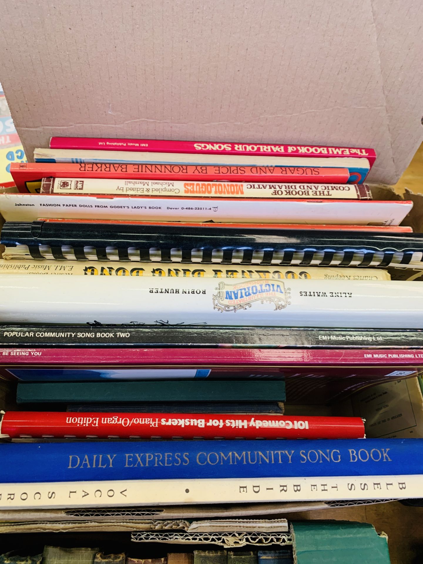21 assorted song books.