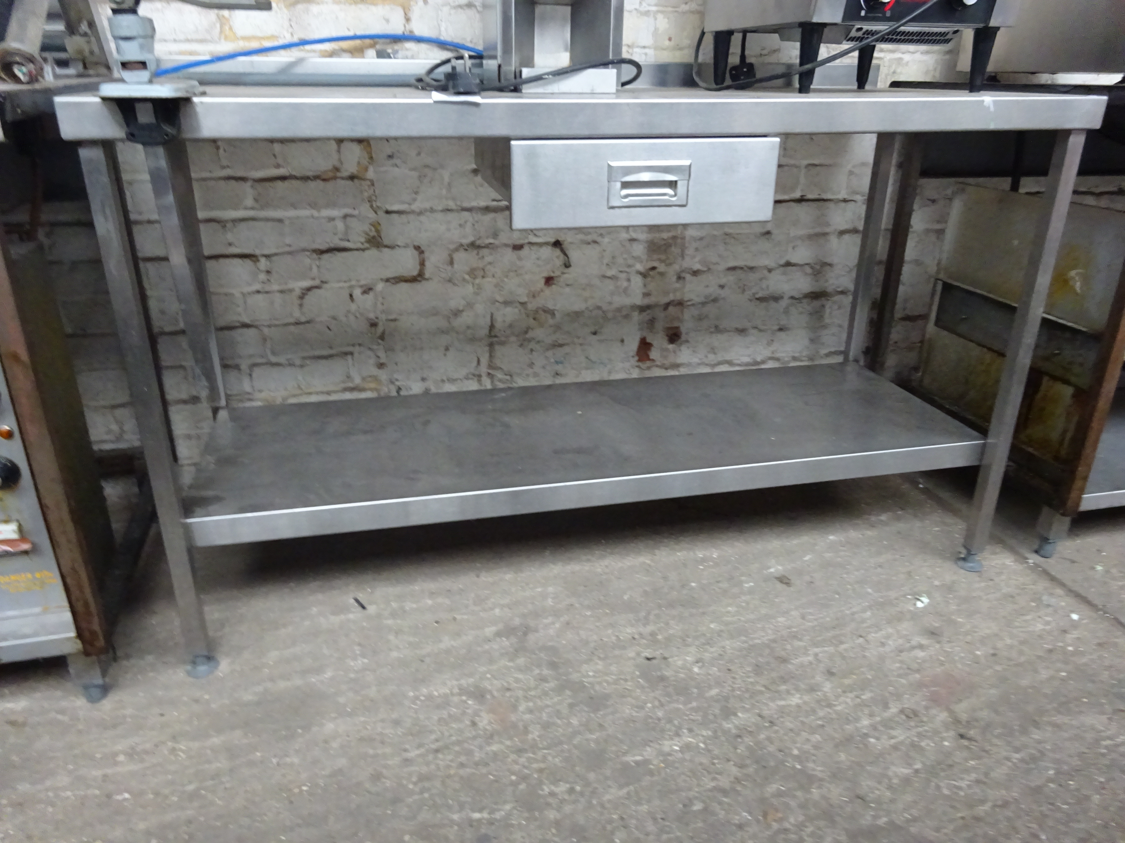 Stainless steel prep table with drawer, under shelf & can opener