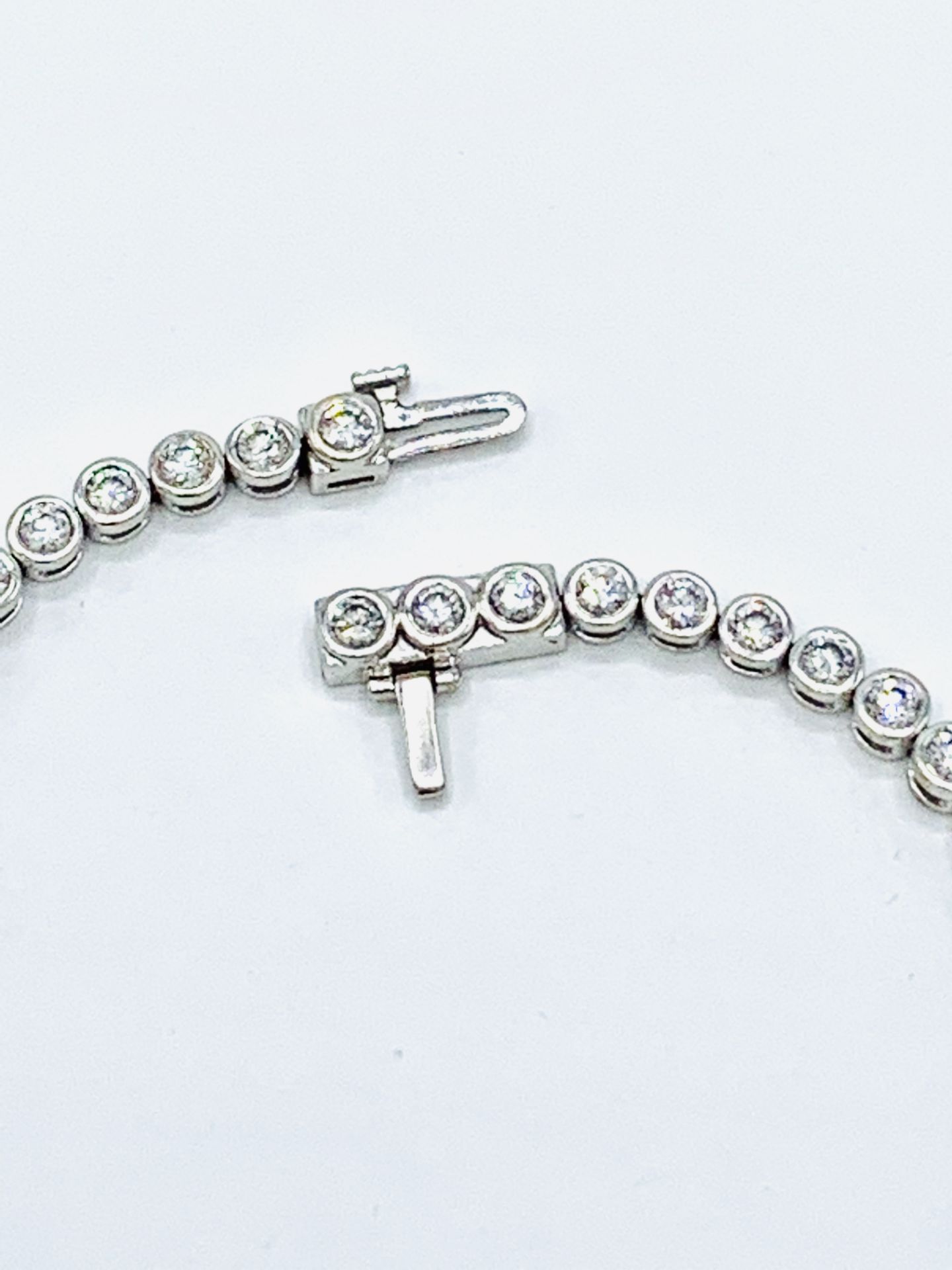 18ct white gold and diamond tennis bracelet. - Image 7 of 7