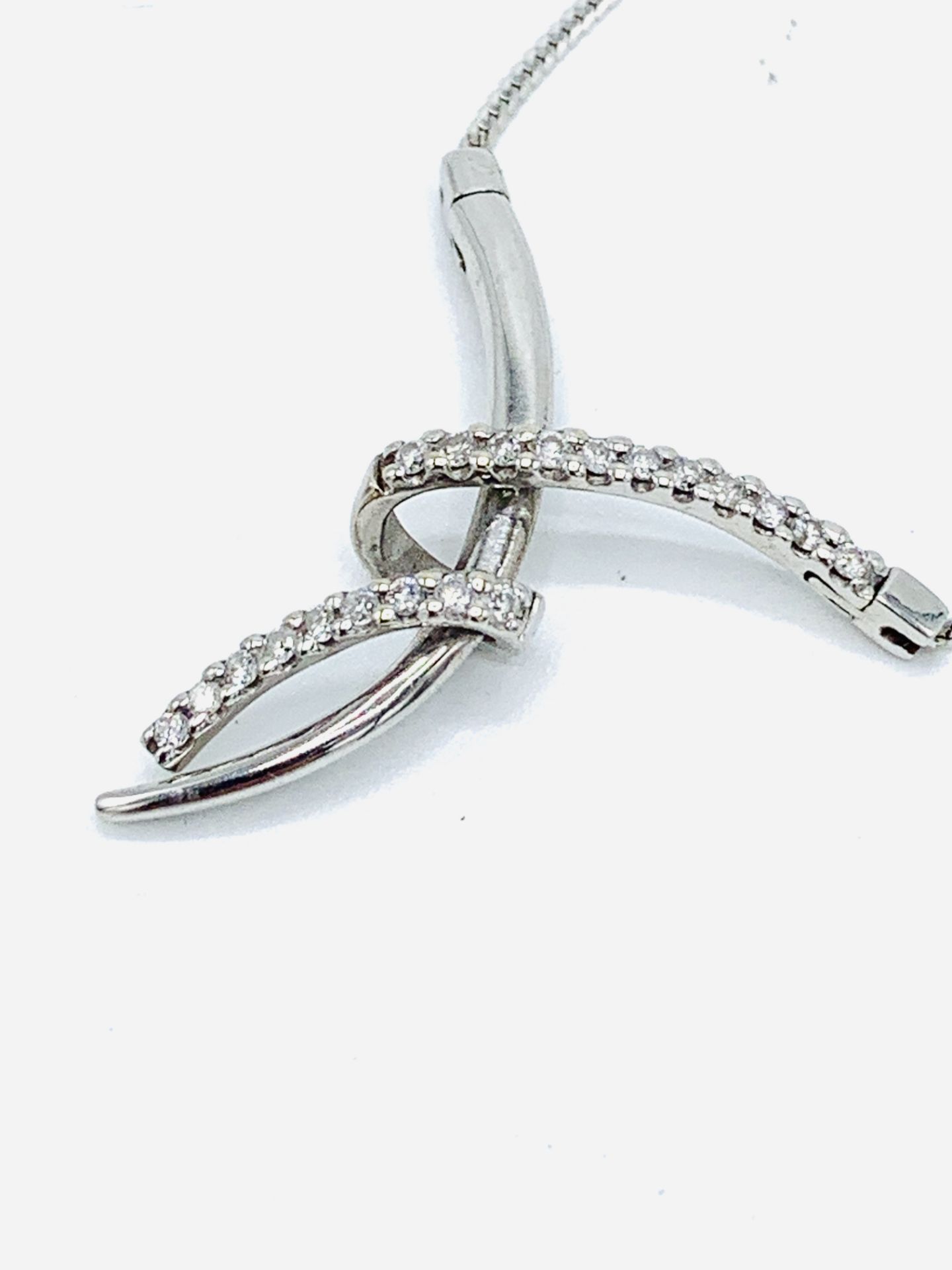 Contemporary white gold & diamond necklace.