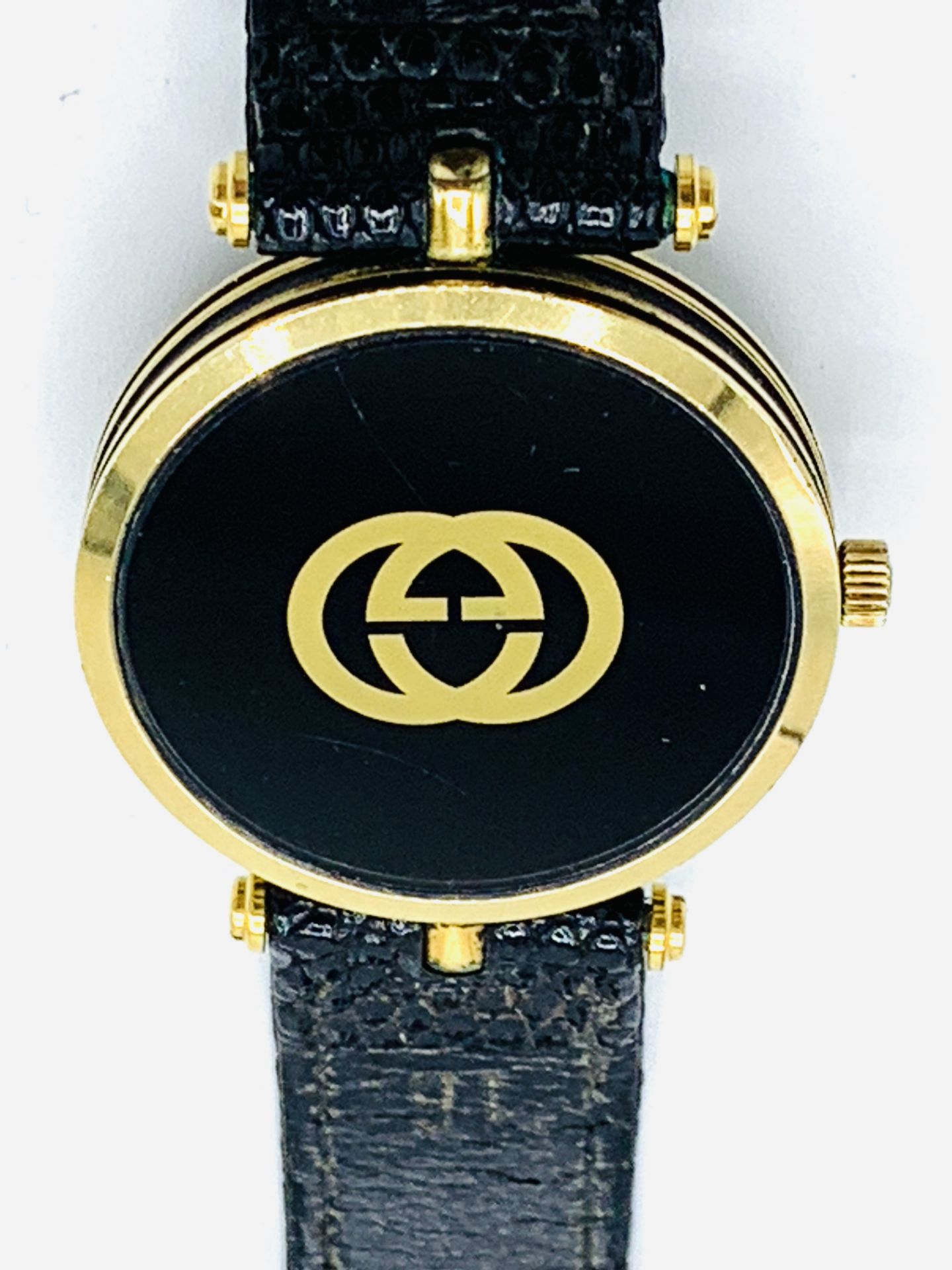 Gucci gold plated and black wrist watch with original strap. - Image 3 of 3