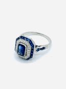 White gold, sapphire and diamond ring.