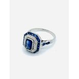 White gold, sapphire and diamond ring.