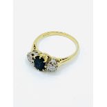 18 k gold, sapphire and diamond trilogy ring.