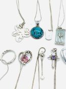 15 individual sterling silver necklaces and pendants.