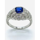 Platinum, diamond and sapphire ring.