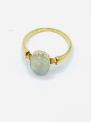 Gold set opal ring.