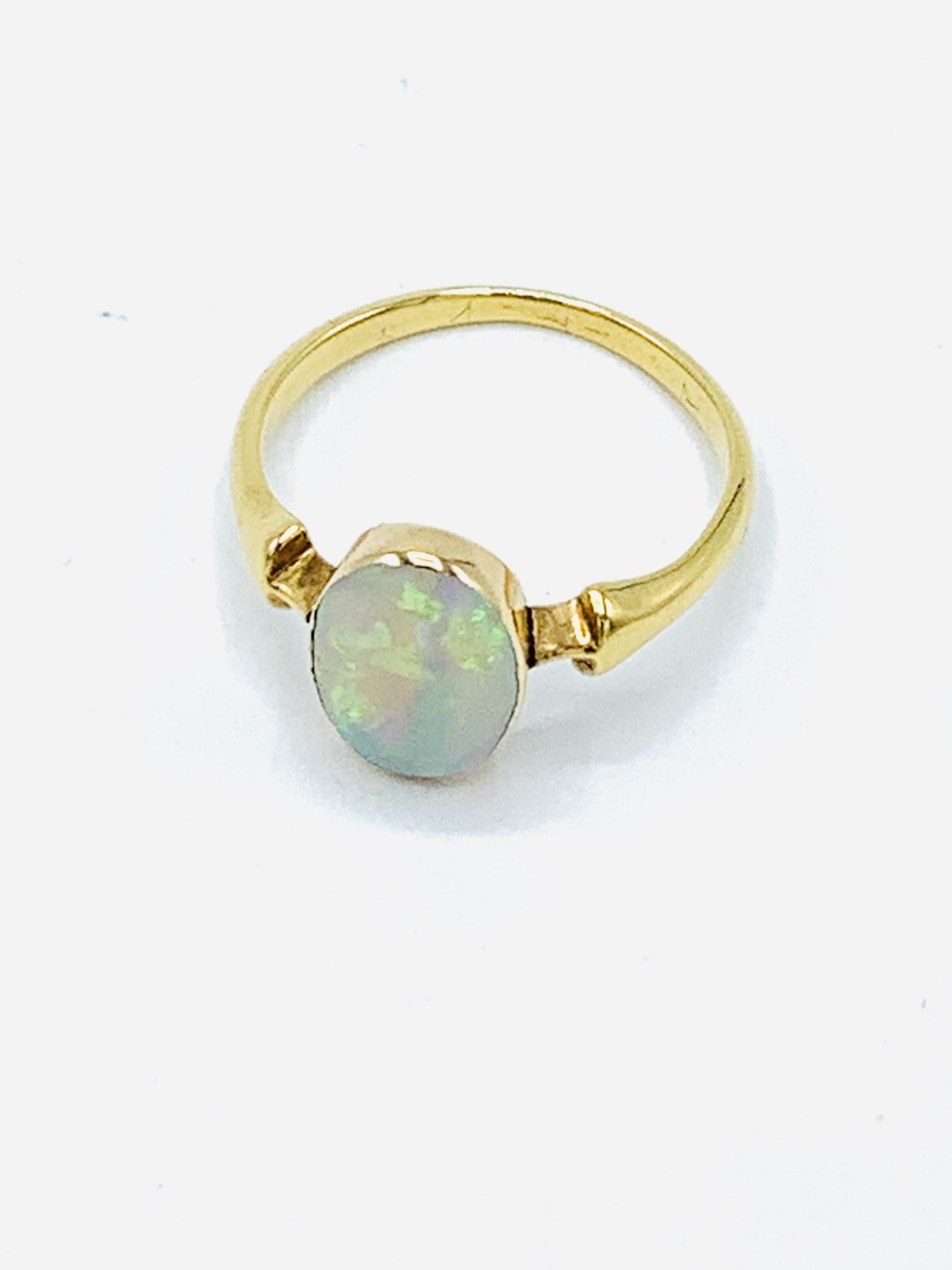 Gold set opal ring.