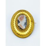 Hard stone cameo brooch.