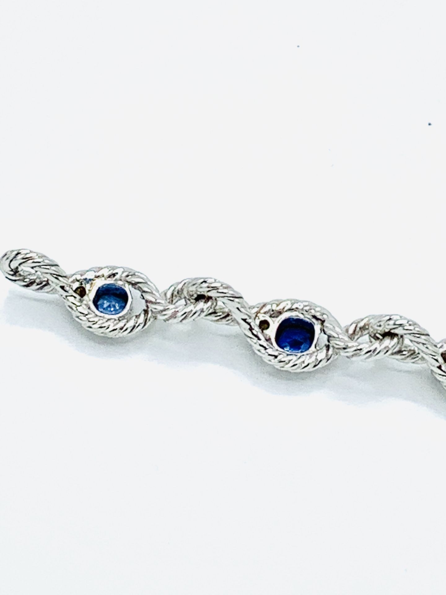 18ct white gold and graduated sapphire twisted bracelet. - Image 6 of 8