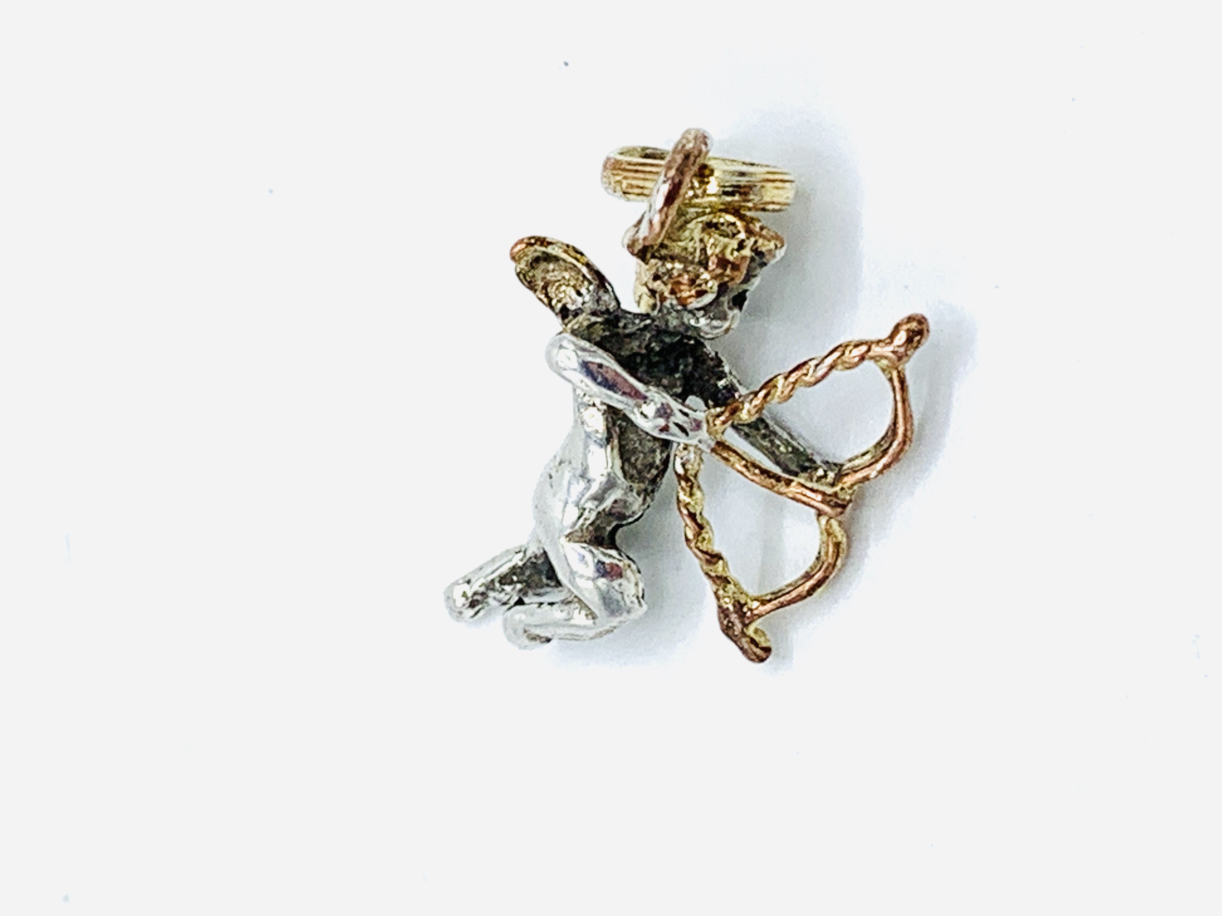 Victorian silver cupid pendant with gilded wings, bow and halo. - Image 4 of 4