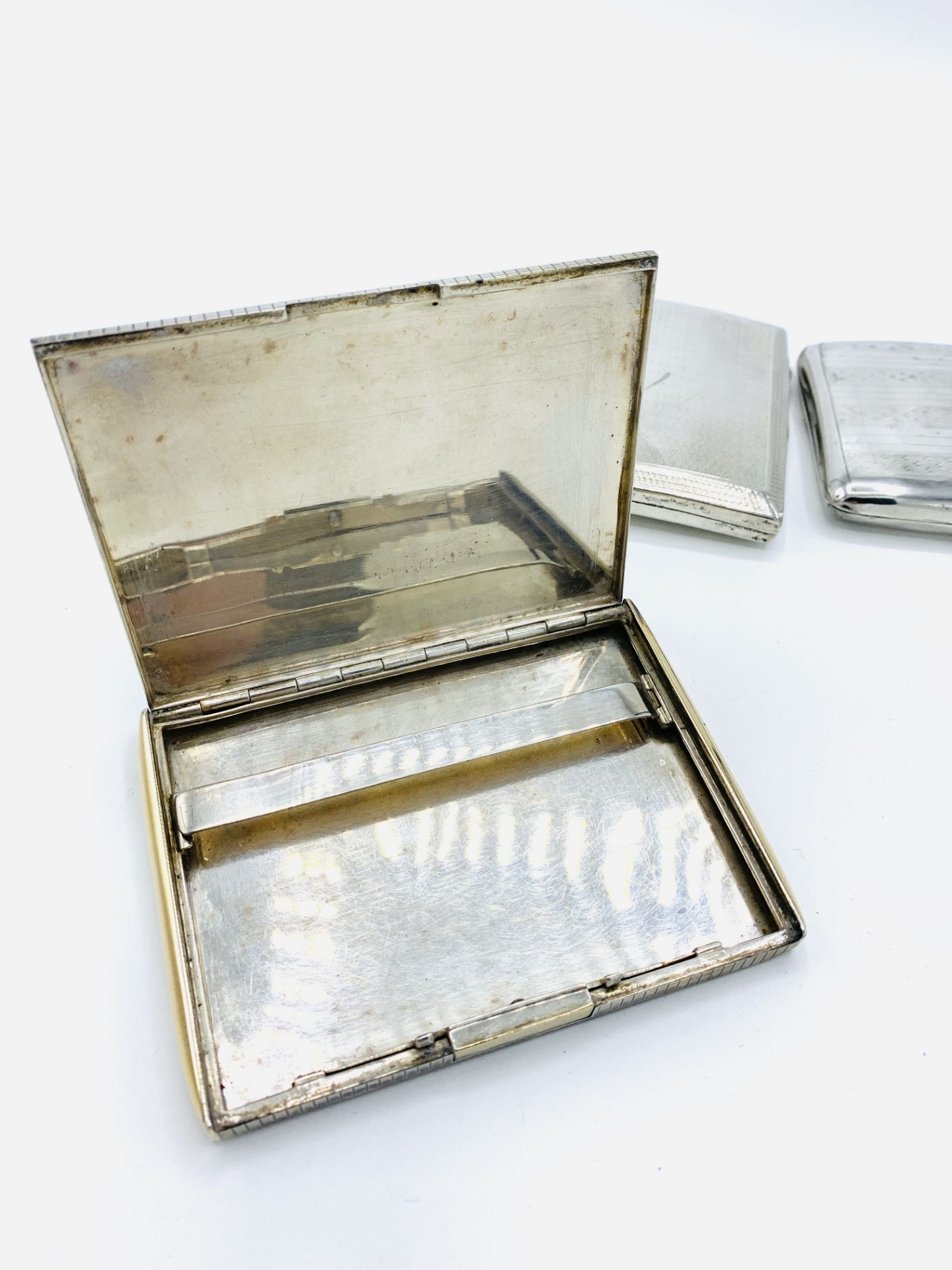 Silver engine-turned cigarette case; silver cigarette case, white and yellow metal cigarette. - Image 3 of 4