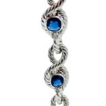 18ct white gold and graduated sapphire twisted bracelet.