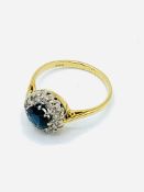 18ct gold, sapphire and diamond cluster ring.